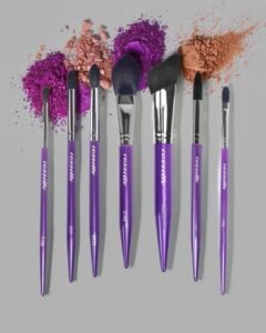 Divinity makeup brushes photographed with eyeshadow swatches aurazette.com