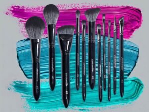 This image shows the Infinite Black Makeup Brushes with color swatches