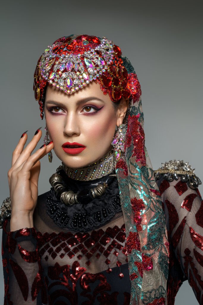 Home Model with artistic makeup by Roque Cozzette using Cozzette Beauty products and a custom headpiece, photographed in an editorial style.