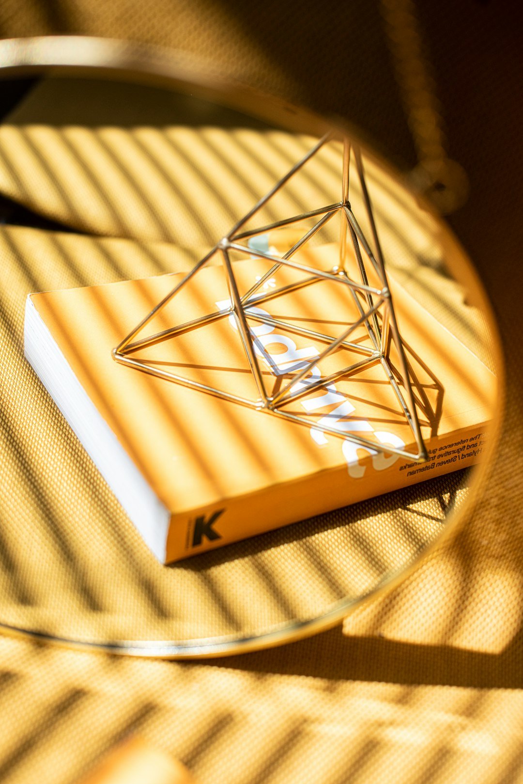 gold and black metal frame mirror reflection